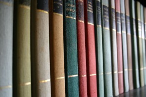 dusting bookshelves