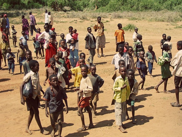 Villagers in Kenya watch the arrival of Mzungu (swahili for Americans)